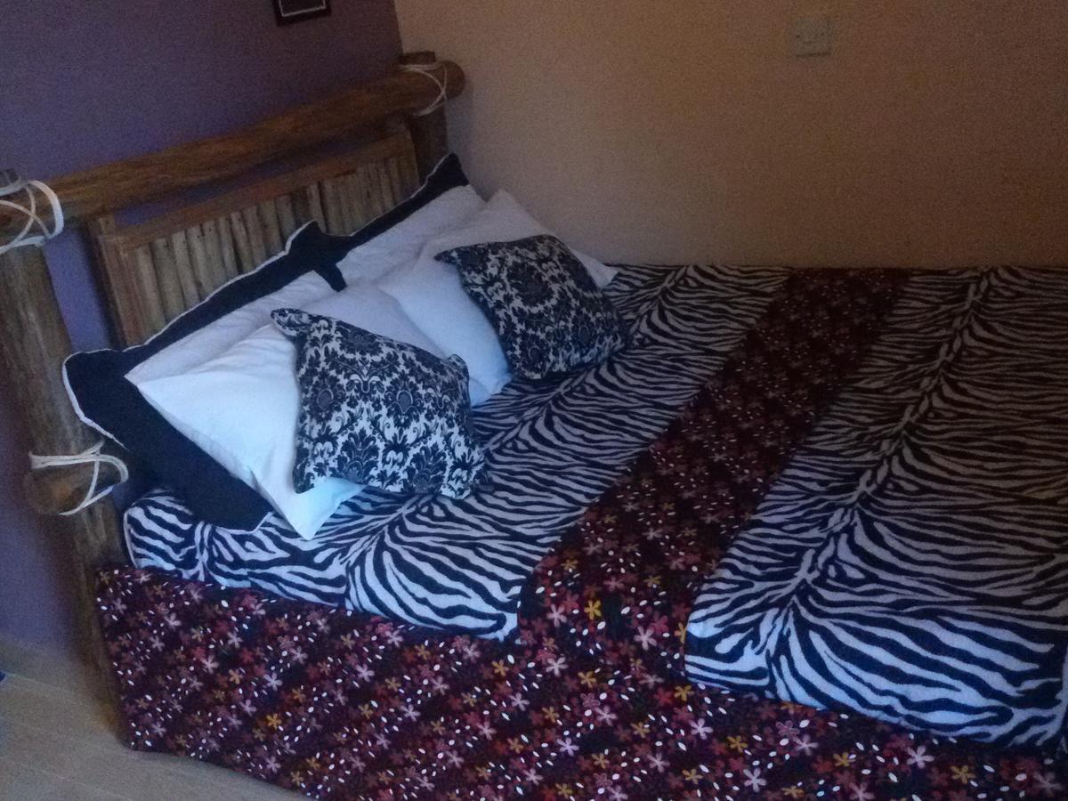 Unik Hotel Kireka Habitación foto